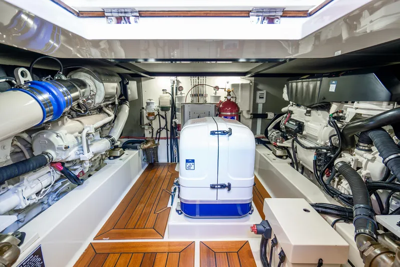 Pitt Stop Yacht Photos Pics Engine room of 2020 Palm Beach Motor Yachts PB55, featuring advanced machinery and equipment.