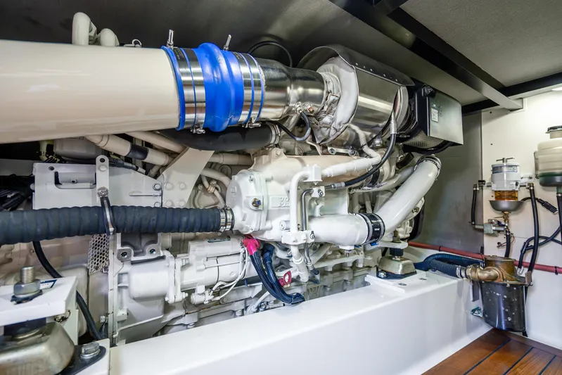 Pitt Stop Yacht Photos Pics Engine room of 2020 Palm Beach Motor Yachts PB55, showcasing advanced marine engineering.