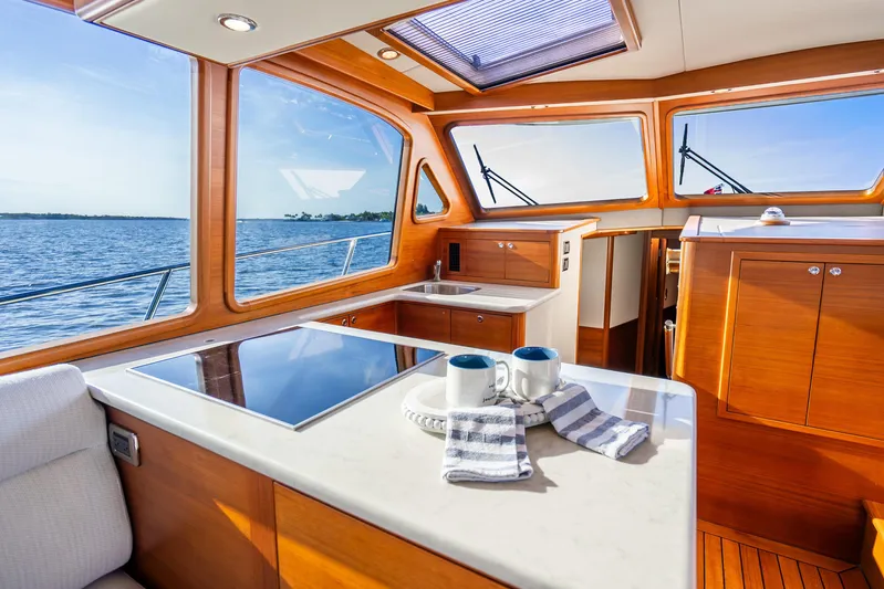 Pitt Stop Yacht Photos Pics Luxurious interior of 2020 Palm Beach Motor Yachts PB55 with ocean view.