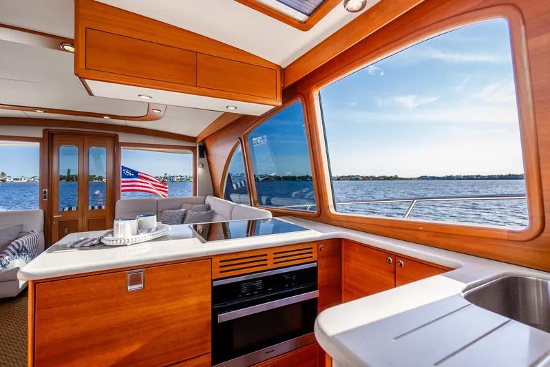 Pitt Stop Yacht Photos Pics Luxurious interior of 2020 Palm Beach Motor Yachts PB55 with scenic ocean view.