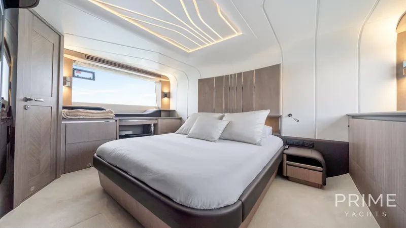  Yacht Photos Pics Luxurious bedroom interior of 2021 Galeon 680 Fly yacht with modern design and ambient lighting.