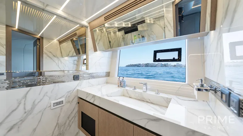  Yacht Photos Pics Luxurious bathroom interior of 2021 Galeon 680 Fly yacht with ocean view.