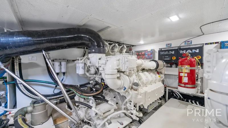 Yacht Photos Pics Engine room of 2021 Galeon 680 Fly yacht with MAN engines and fire safety equipment.