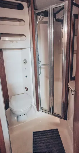  Yacht Photos Pics Bathroom interior of 1993 Luhrs 350 Tournament yacht with shower and toilet.