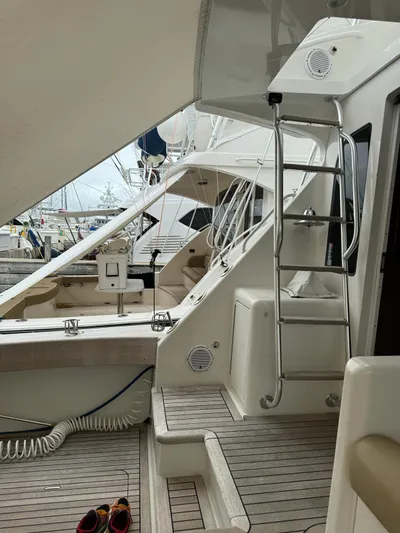  Yacht Photos Pics 2010 Viking 54 Convertible yacht interior with ladder and deck view.