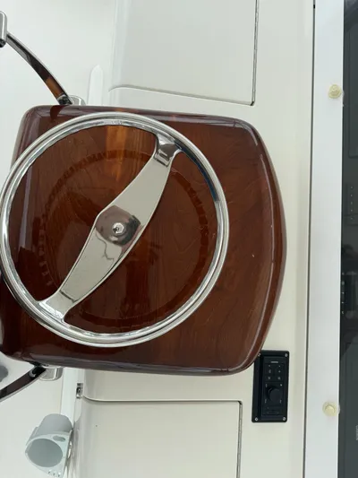  Yacht Photos Pics Steering wheel of a 2010 Viking 54 Convertible yacht.