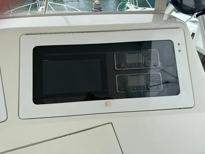  Yacht Photos Pics Control panel of a 2010 Viking 54 Convertible yacht with navigation and communication equipment.