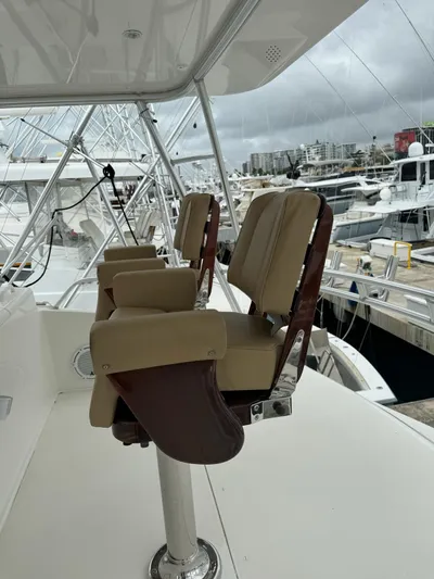  Yacht Photos Pics Luxury seating on the 2010 Viking 54 Convertible yacht at a marina.