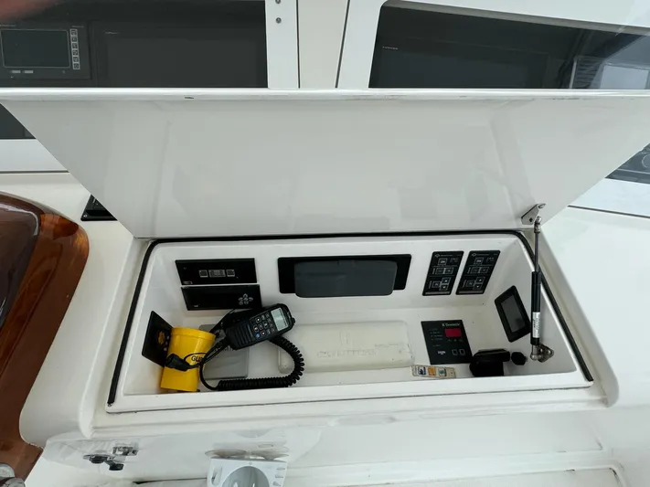  Yacht Photos Pics Control panel of a 2010 Viking 54 Convertible yacht with various instruments and devices.