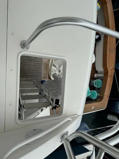  Yacht Photos Pics View from a 2010 Viking 54 Convertible yacht showing a ladder and deck area.