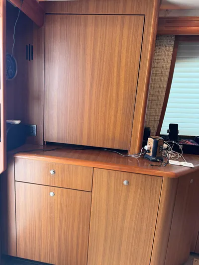  Yacht Photos Pics Wooden cabinetry inside a 2010 Viking 54 Convertible yacht.