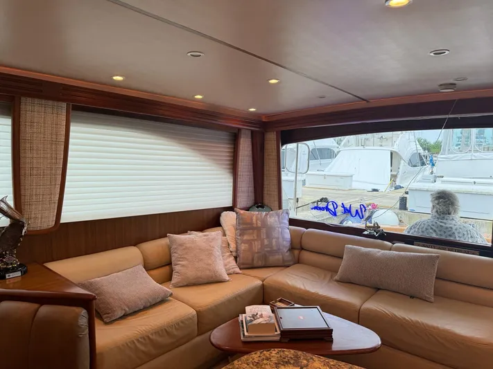  Yacht Photos Pics Luxurious interior of a 2010 Viking 54 Convertible yacht with a comfortable seating area.