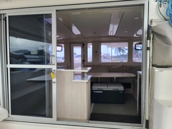 Kitten Caboodle Yacht Photos Pics Interior view of 2015 Leopard 44 catamaran, featuring spacious seating and modern design.