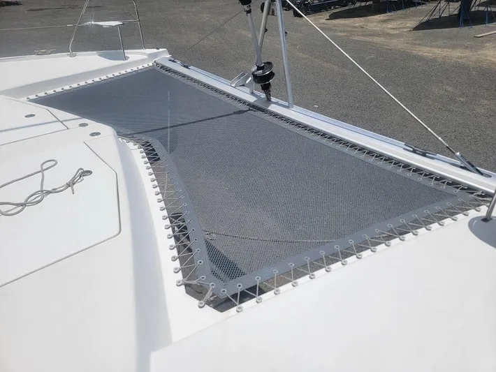 Kitten Caboodle Yacht Photos Pics Trampoline net on a 2015 Leopard 44 catamaran deck.