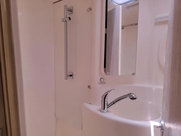 Kitten Caboodle Yacht Photos Pics Modern bathroom in 2015 Leopard 44 yacht with sleek sink and mirror.
