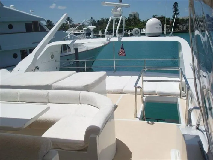  Yacht Photos Pics Luxurious 1993 Tecnomarine yacht deck with plush seating and ocean view.
