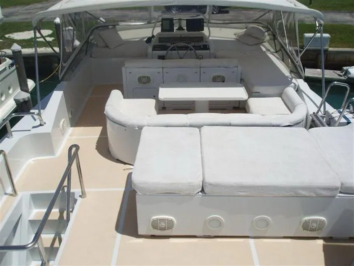 Yacht Photos Pics Luxurious 1993 Tecnomarine yacht interior with spacious seating and helm.