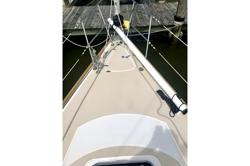  Yacht Photos Pics Deck view of a 2002 Sabre 402 sailboat docked at a marina.