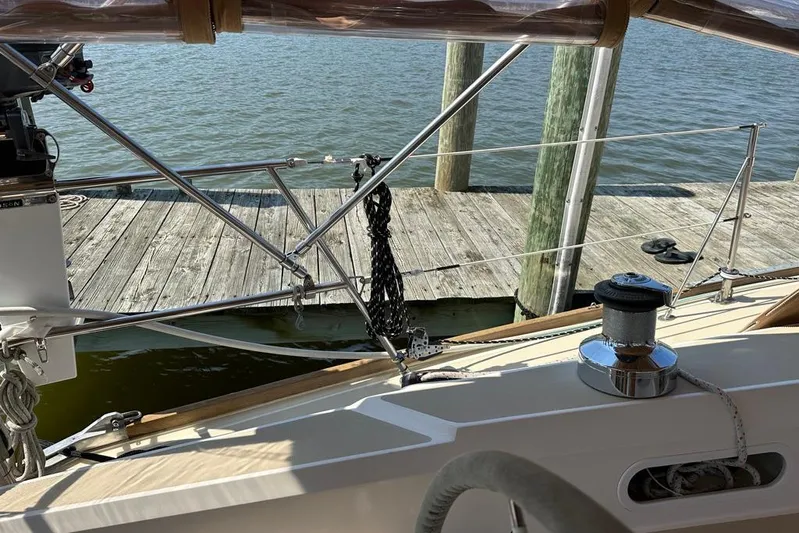  Yacht Photos Pics Sailboat deck view, Sabre 402, 2002 model, docked by wooden pier.
