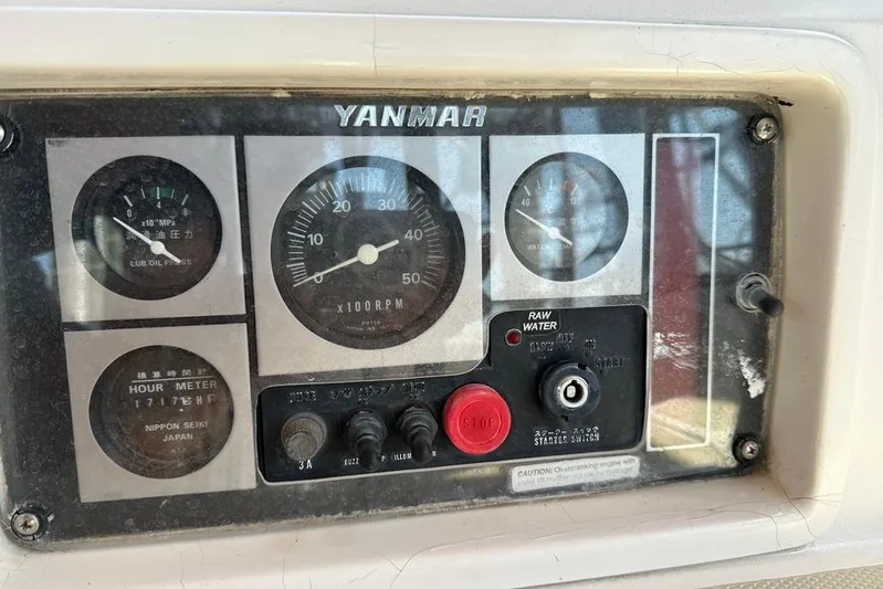  Yacht Photos Pics Yanmar engine control panel on a 2002 Sabre 402 sailboat, featuring gauges and switches.