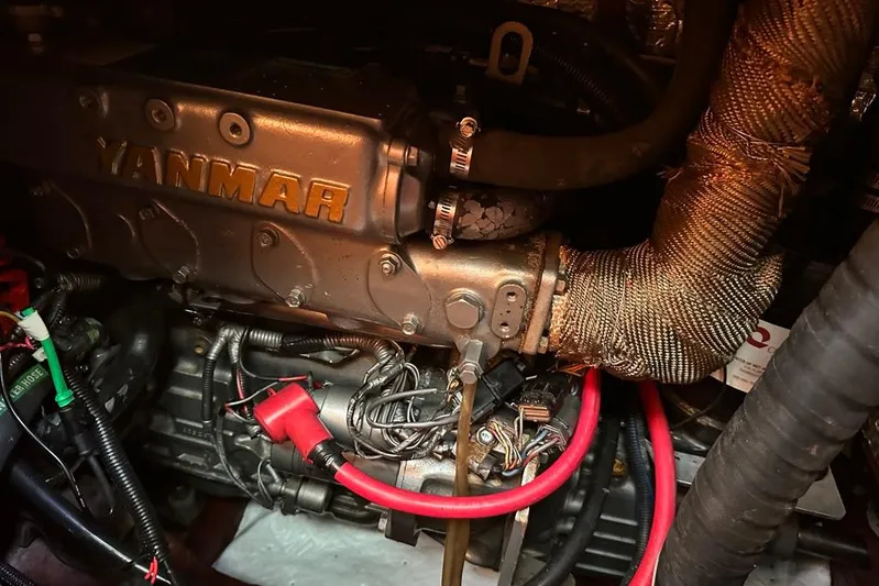  Yacht Photos Pics Engine compartment of a 2002 Sabre 402 with Yanmar components and red wiring.