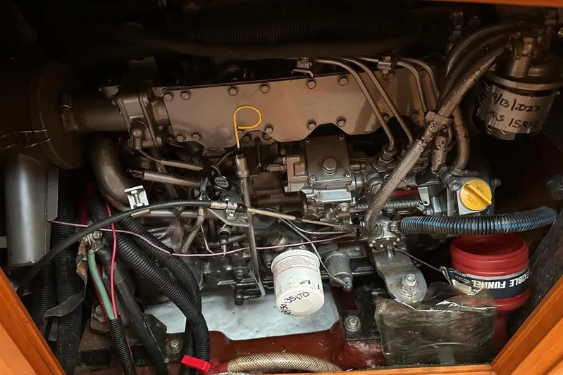  Yacht Photos Pics Engine compartment of a 2002 Sabre 402, showcasing intricate mechanical components and wiring.