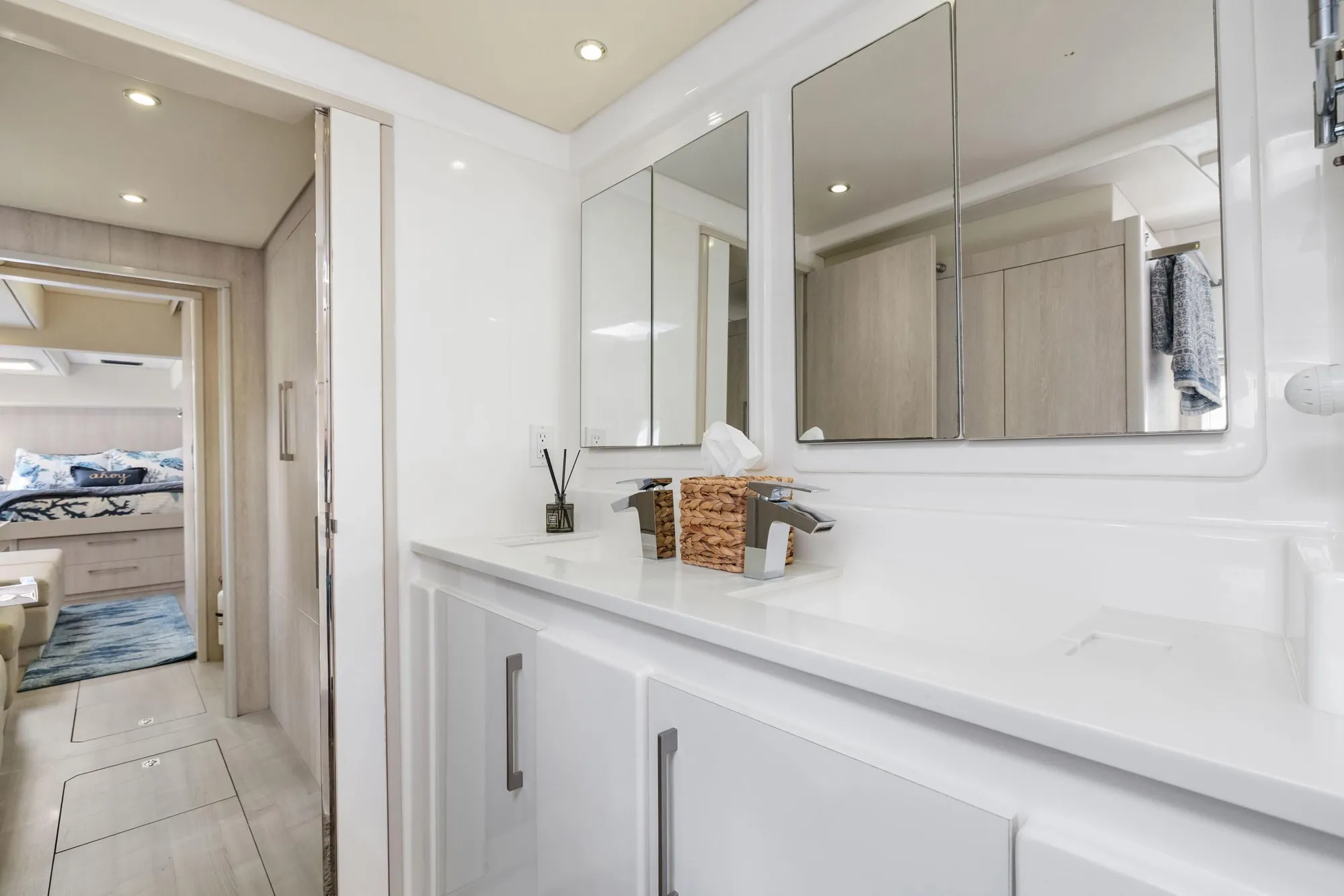 Luxurious bathroom interior of 2015 Leopard 58 yacht with modern fixtures and spacious design.