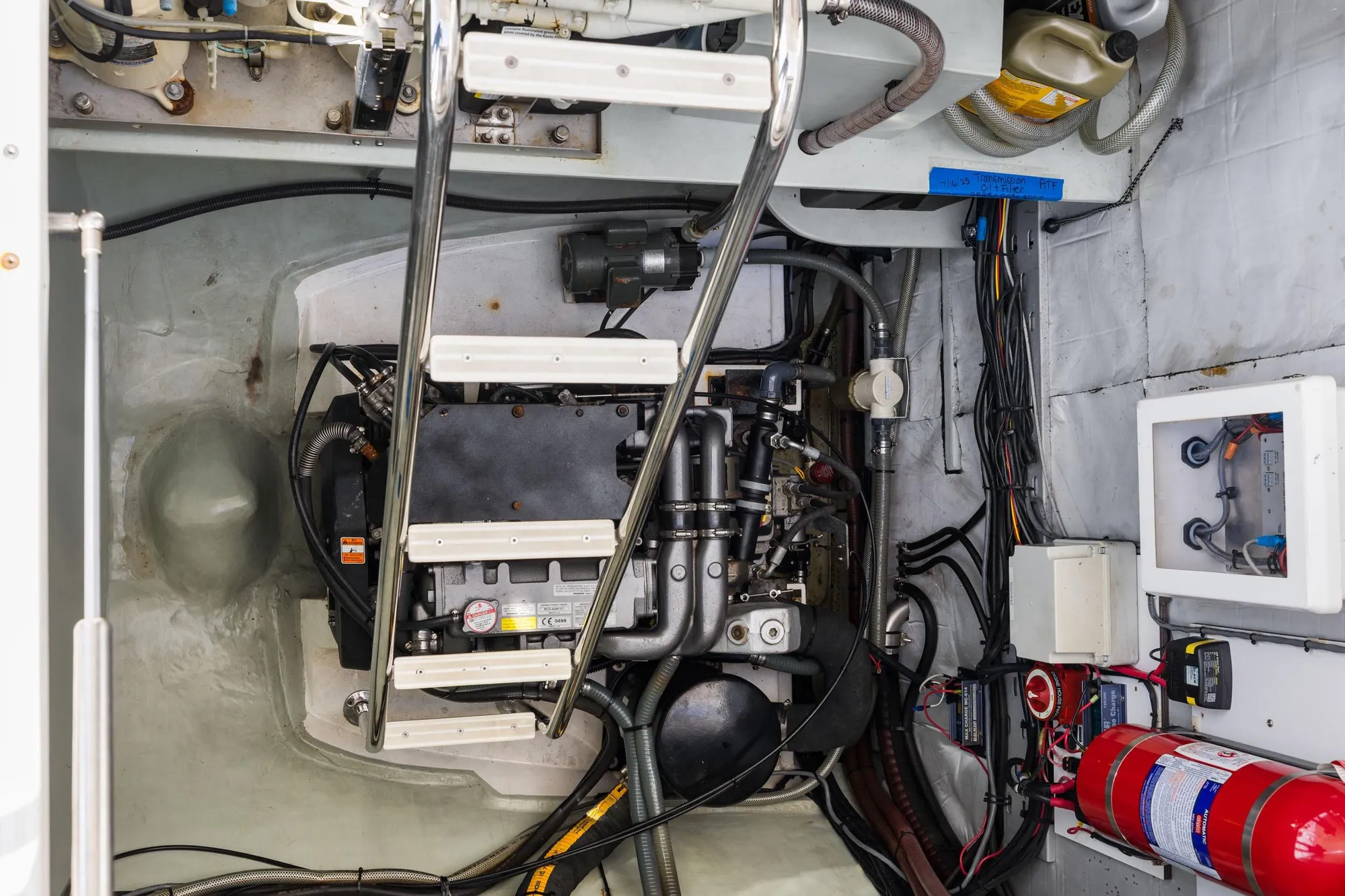 Engine room of a 2015 Leopard 58 yacht with visible machinery and equipment.