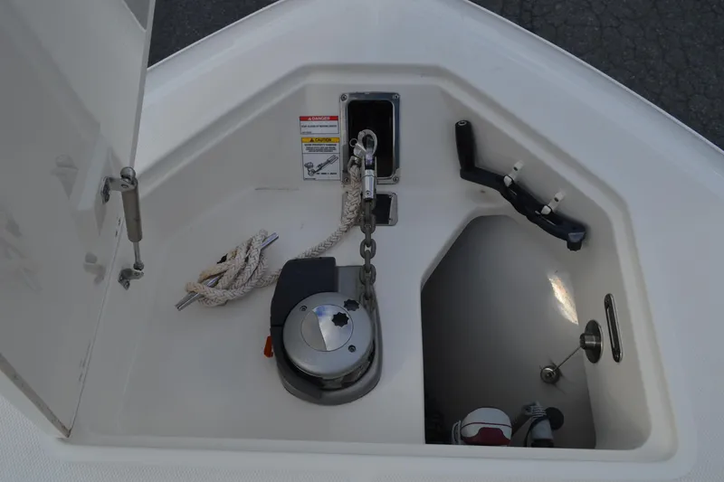  Yacht Photos Pics 2018 Boston Whaler 330 Outrage anchor locker with chain and rope storage.
