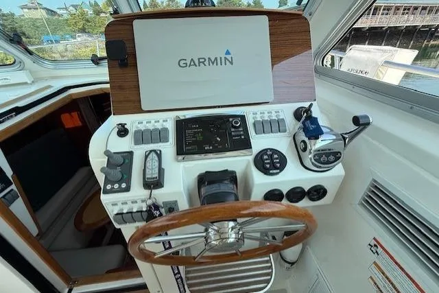 Naut On Call Yacht Photos Pics Helm of 2016 Back Cove 34 boat with Garmin navigation system.