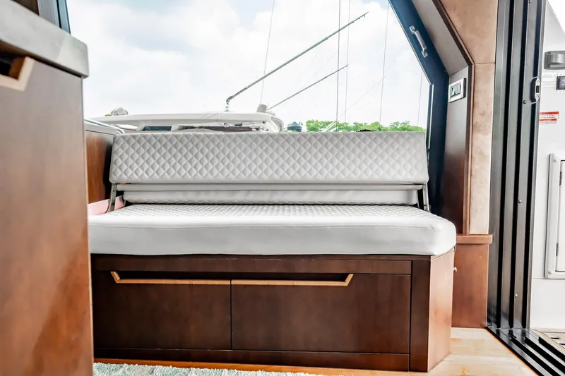 Bikini Blues Yacht Photos Pics Luxurious interior seating on 2017 Galeon 510 Sky yacht with quilted upholstery.