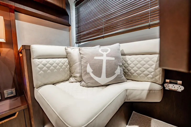 Bikini Blues Yacht Photos Pics Luxurious interior of 2017 Galeon 510 Sky yacht with anchor-themed cushion.