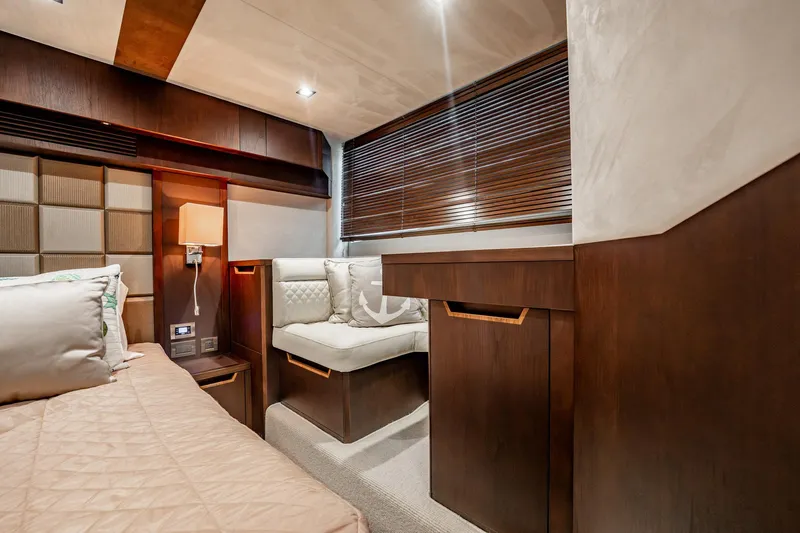 Bikini Blues Yacht Photos Pics Luxurious interior of 2017 Galeon 510 Sky yacht with elegant wood finishes and cozy seating.