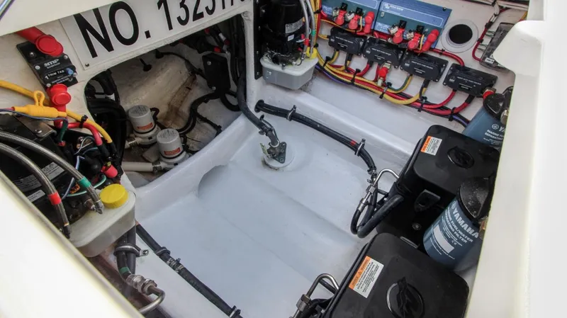 "alpha Bravo" Yacht Photos Pics 2022 Intrepid 375 Nomad SE engine compartment with wiring and battery setup.