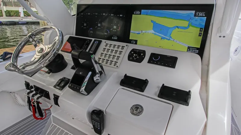 "alpha Bravo" Yacht Photos Pics 2022 Intrepid 375 Nomad SE helm with navigation display and controls.