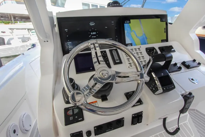 "alpha Bravo" Yacht Photos Pics Helm of 2022 Intrepid 375 Nomad SE with advanced navigation displays and controls.