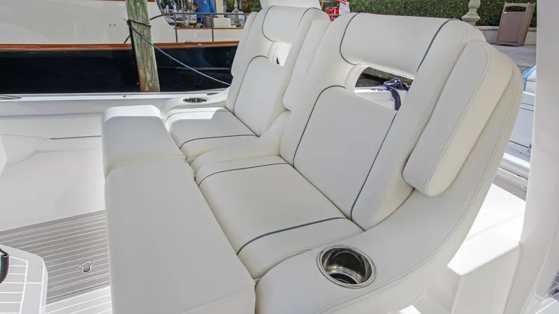 "alpha Bravo" Yacht Photos Pics Luxurious seating on 2022 Intrepid 375 Nomad SE boat with cup holders.