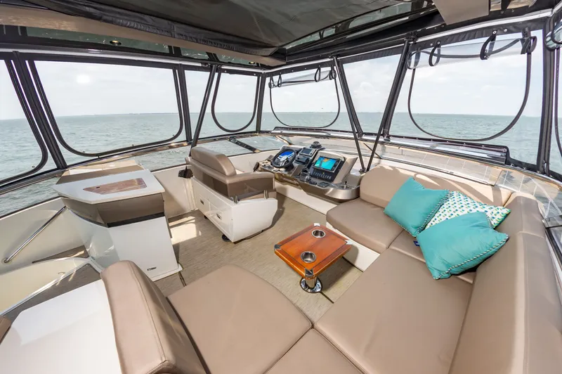 Docked Wages Yacht Photos Pics Luxurious interior of 2013 Marquis 63 Sport Yacht with ocean view.