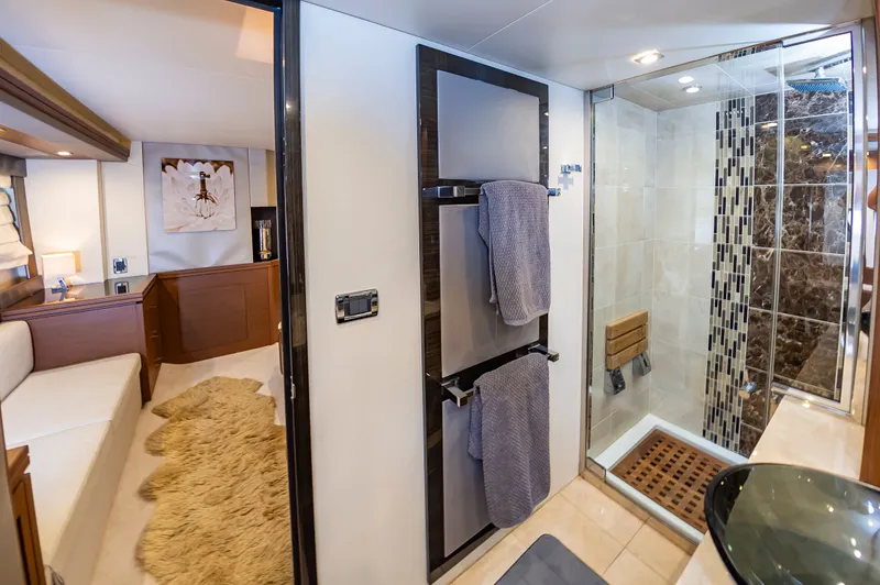 Docked Wages Yacht Photos Pics Luxurious bathroom and cabin interior of 2013 Marquis 63 Sport Yacht.