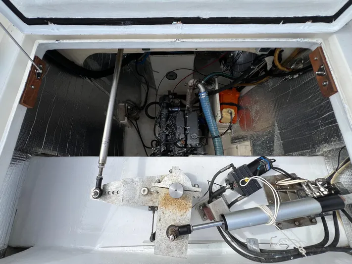 Trebuchet Yacht Photos Pics Engine compartment of a 2000 Switch 51 boat showing mechanical components and wiring.