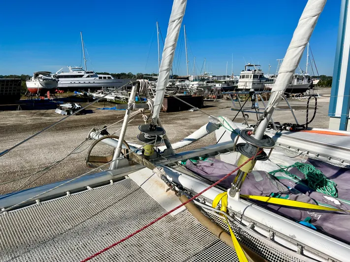 Trebuchet Yacht Photos Pics Sailboat Switch 51, year 2000, docked in a marina with other boats.