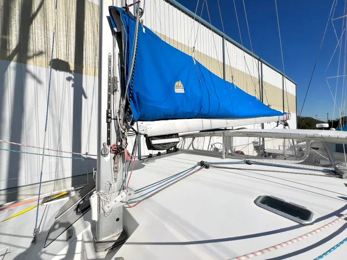Trebuchet Yacht Photos Pics Sailboat deck with blue sail cover, Switch 51 model, year 2000.