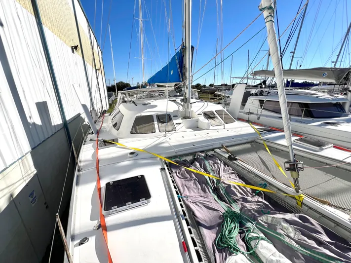 Trebuchet Yacht Photos Pics Sailboat Switch 51, year 2000, docked with sails and rigging visible.