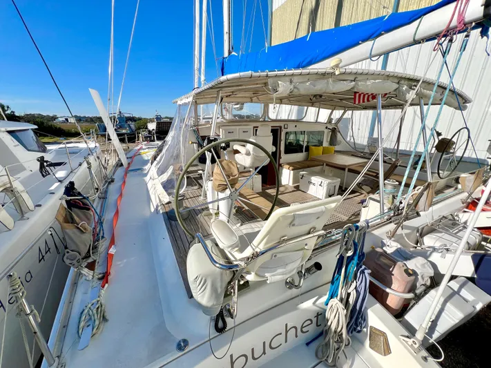 Trebuchet Yacht Photos Pics Sailboat Switch 51, year 2000, docked with visible cockpit and steering wheel.