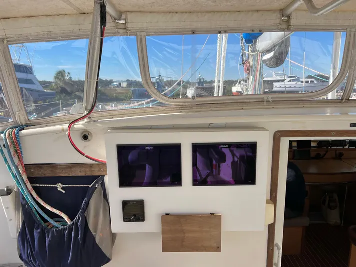 Trebuchet Yacht Photos Pics Sailing yacht cockpit with navigation screens, Switch 51 model, year 2000.