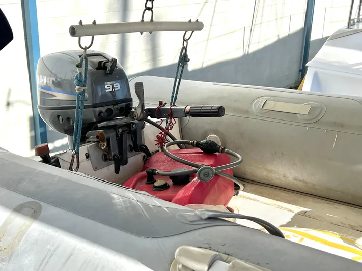 Trebuchet Yacht Photos Pics Inflatable boat with Yamaha 9.9 motor and red fuel tank, Switch model 51, year 2000.