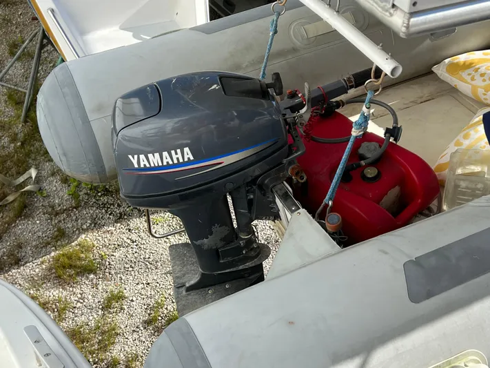 Trebuchet Yacht Photos Pics Yamaha outboard motor on inflatable boat, Switch model 51, year 2000.
