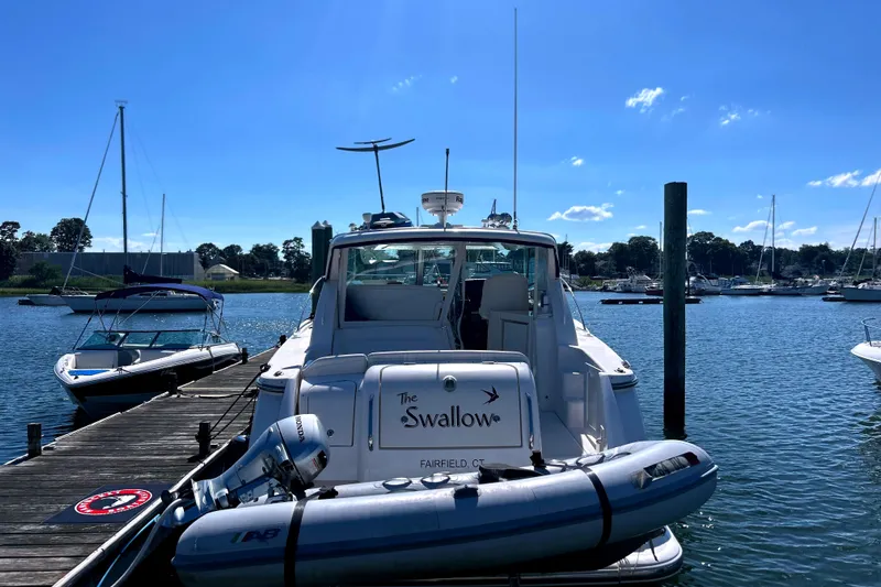  Yacht Photos Pics 2008 Tiara Yachts 3500 Sovran docked at marina under clear blue sky.