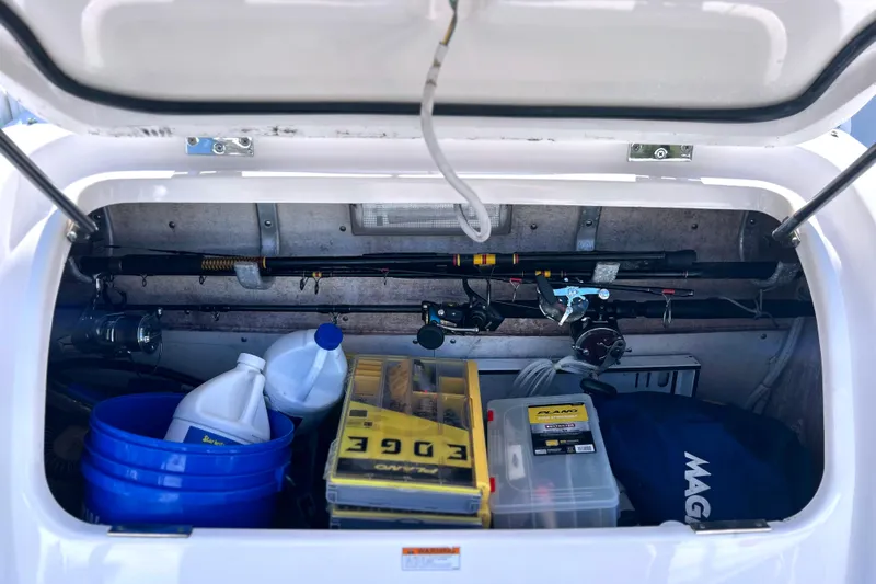  Yacht Photos Pics Storage compartment of 2008 Tiara Yachts 3500 Sovran with fishing gear and supplies.