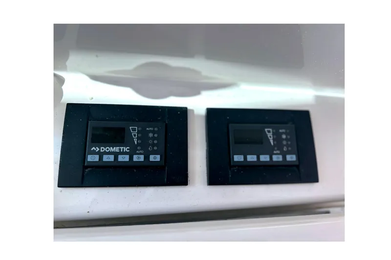  Yacht Photos Pics Dometic control panels on 2008 Tiara Yachts 3500 Sovran, displaying settings and buttons.